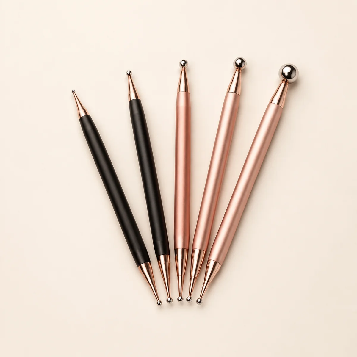 Illustrative assortment of double-ended nail art dotting pens for wholesale sourcing